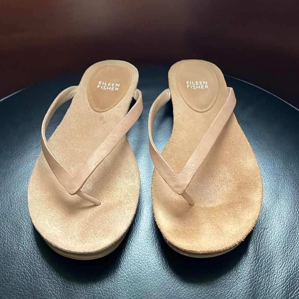 Eileen Fisher: Leather strap flip flop sandal.